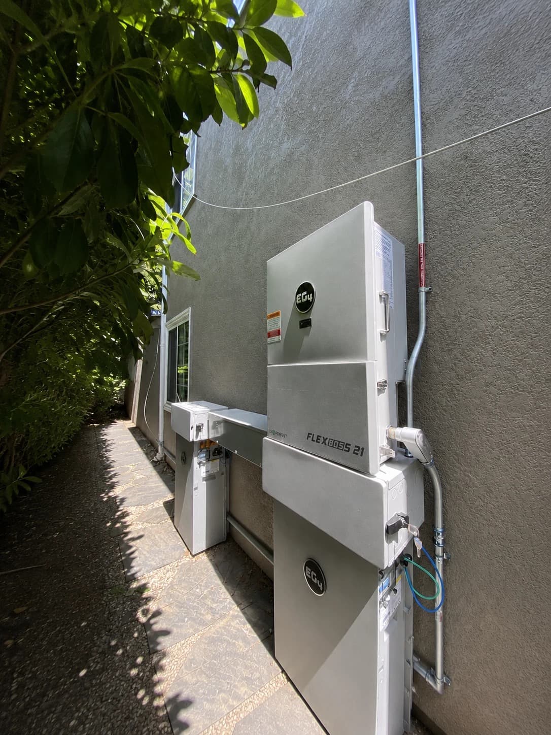 Permitted EG4 FlexBoss 21 install in the side yard of a Burlingame home